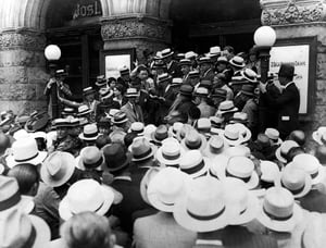 journalists wearing hats